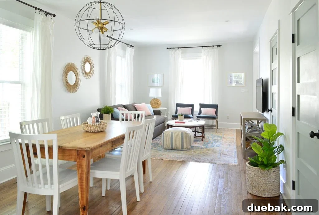 Seeing a Blogger's Home Beyond the Perfect Shots 8 View Into Open Living And Dining Room With Wood Table And Cage Chandelier