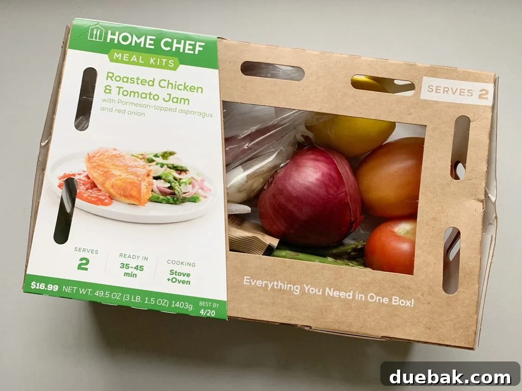Close-up of a partially prepared meal delivery kit ingredients, showing fresh vegetables and sauces, ready for cooking.