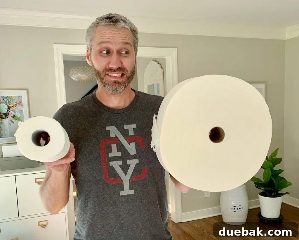 Comparison of a standard double roll toilet paper with the massive Forever Roll.