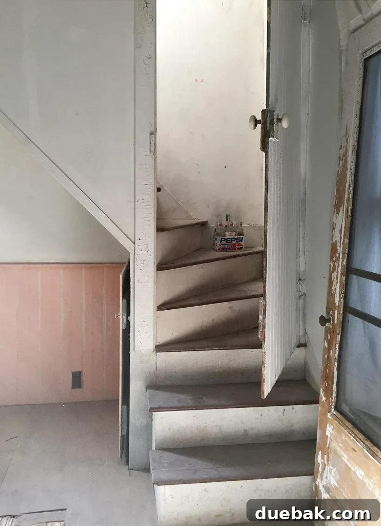 Home Design's White Elephants 6 Before shot of 100+ year old beach house pine floors, showing wear and tear.