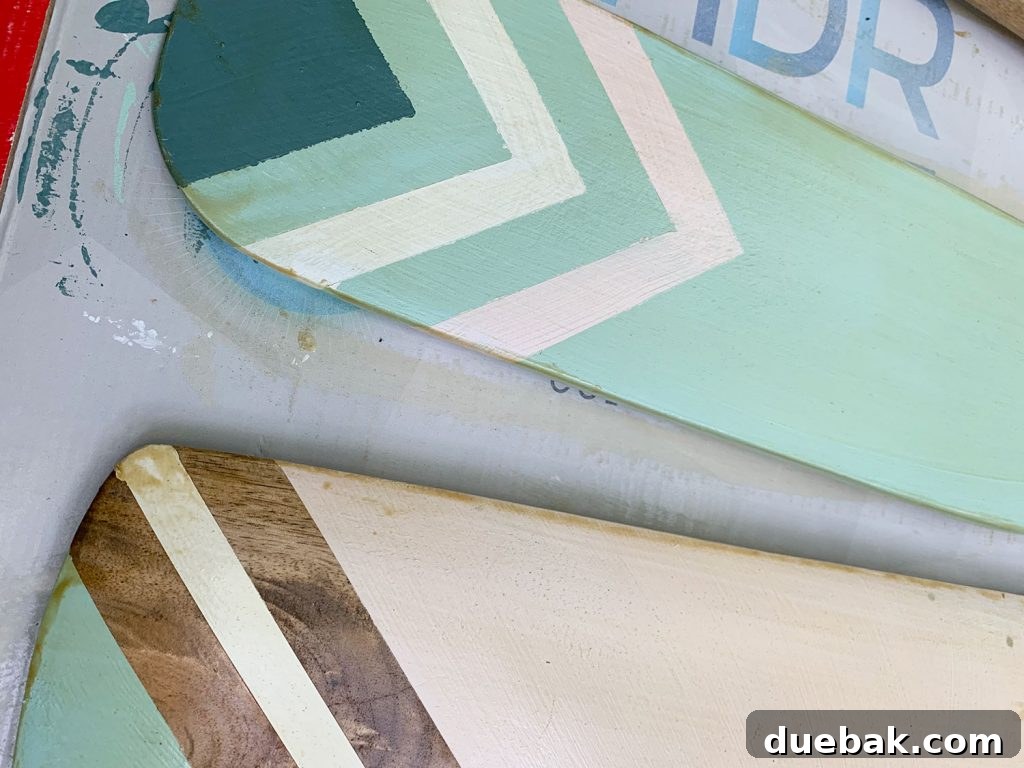 Decorative oar showing yellowing and streaks from an improper sealer