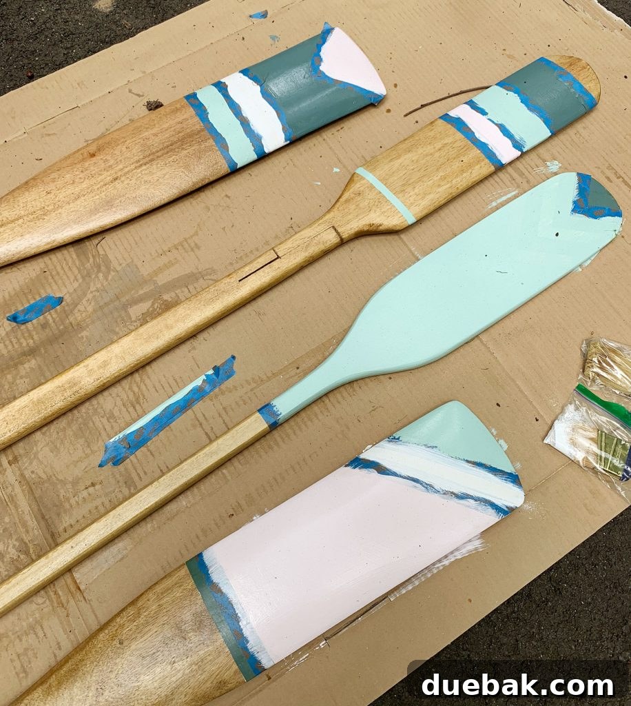 Decorative oar after being repainted to correct sealer issues