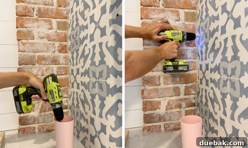 Dipping Drill Bit Into Cup of Water While Drilling Through Tile