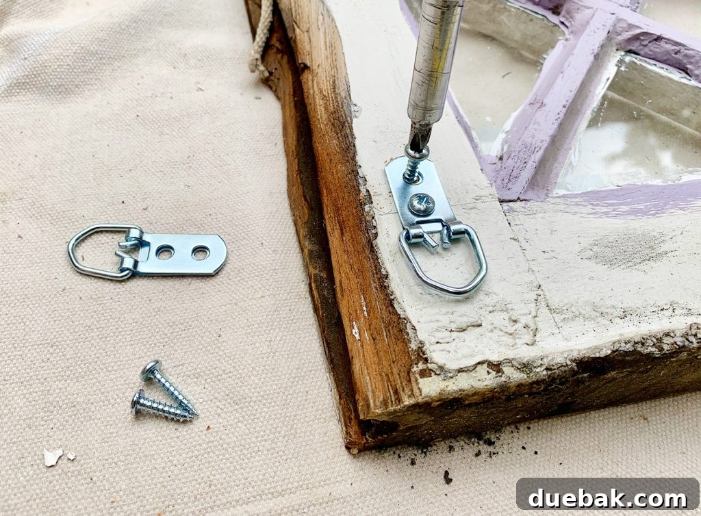 Screwing D Rings To Hang Diamond Glass Window
