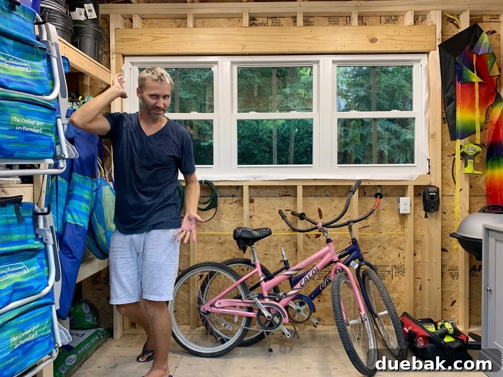 Taming the Beach House Shed 4 Humorous shot of the author posing inside the shed