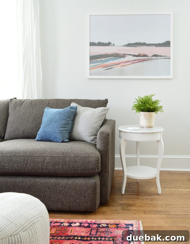 Juniper Print Shop Art In Bright Living Room With Marble Table Crate And Barrel Sofa
