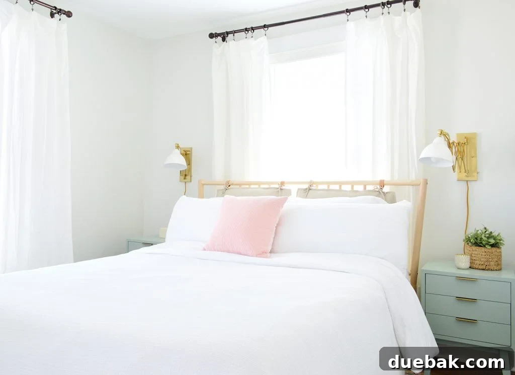 Coastal themed bedroom with white furniture