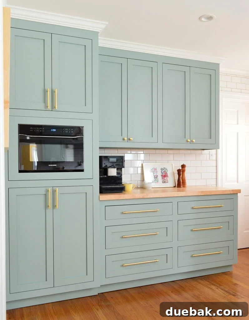 Elevate Your Kitchen Inset Doors for a Custom Cabinet Makeover 9 Tall Pantry Cabinets With Coffee Counter In Halcyon Green Blue Kitchen