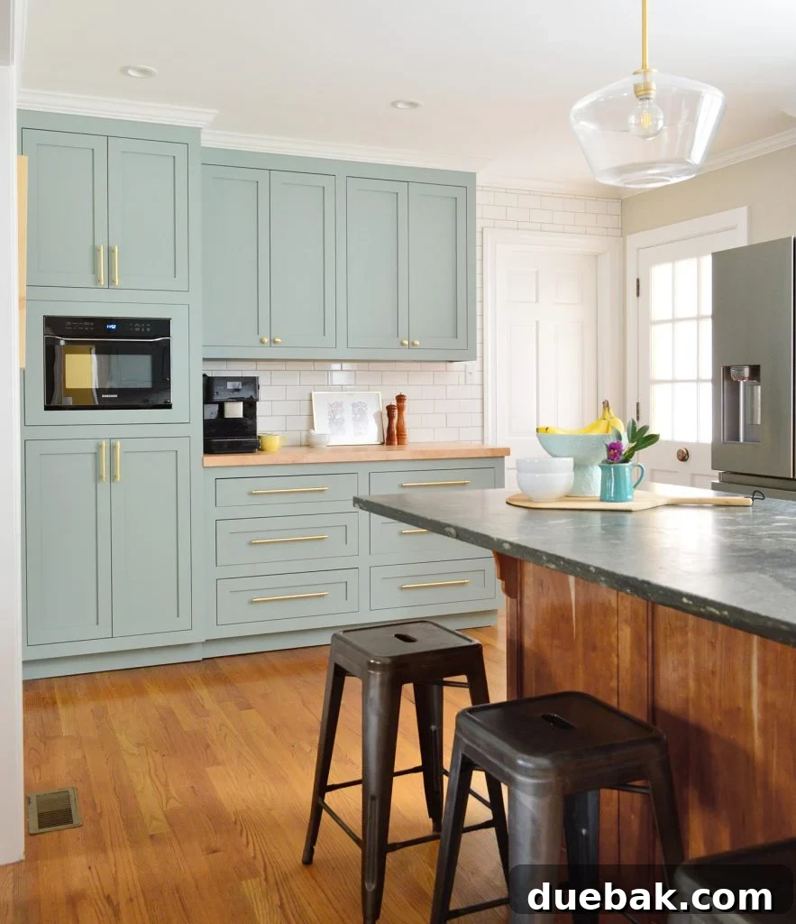 Elevate Your Kitchen Inset Doors for a Custom Cabinet Makeover 7 After Photo Of Laundry Area Turned Pantry Cabinets In Halcyon Green Blue Kitchen With Wood Island
