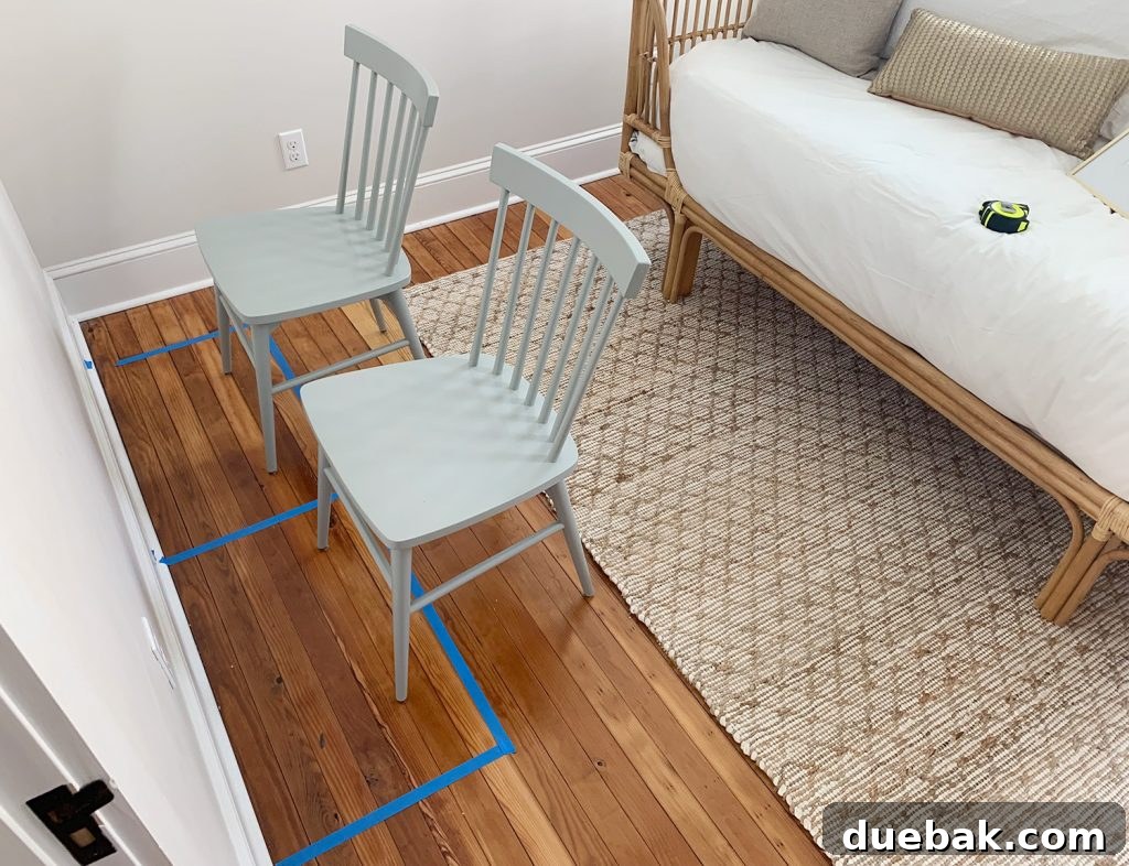 4 Smart Decor Hacks for an Effortless Home Transformation 10 Painter's tape on the floor marking the footprint for a desk and chairs