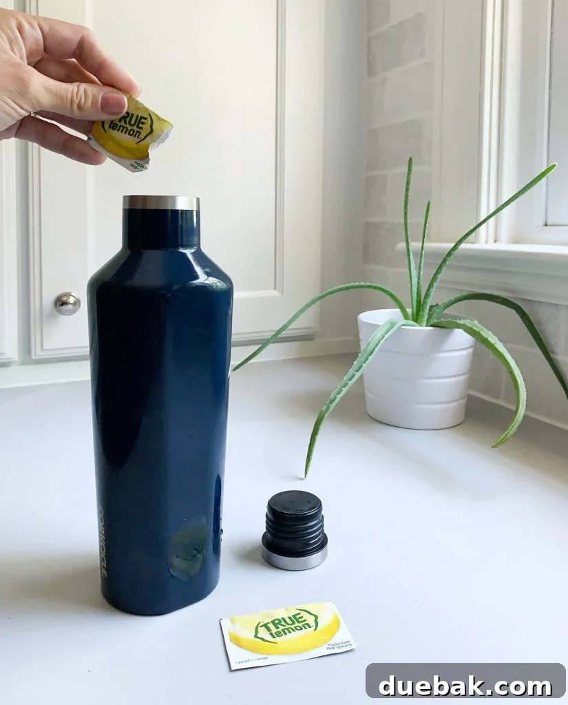 A stylish Corkcicle canteen and tumbler, perfect for hydration and keeping drinks cold or hot
