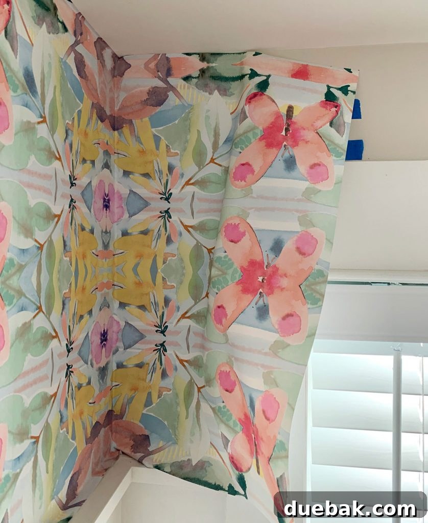 Effortlessly Install Peel and Stick Wallpaper 14 Peel And Stick Wallpaper Overlapping Window Trim Before Cutting To Size