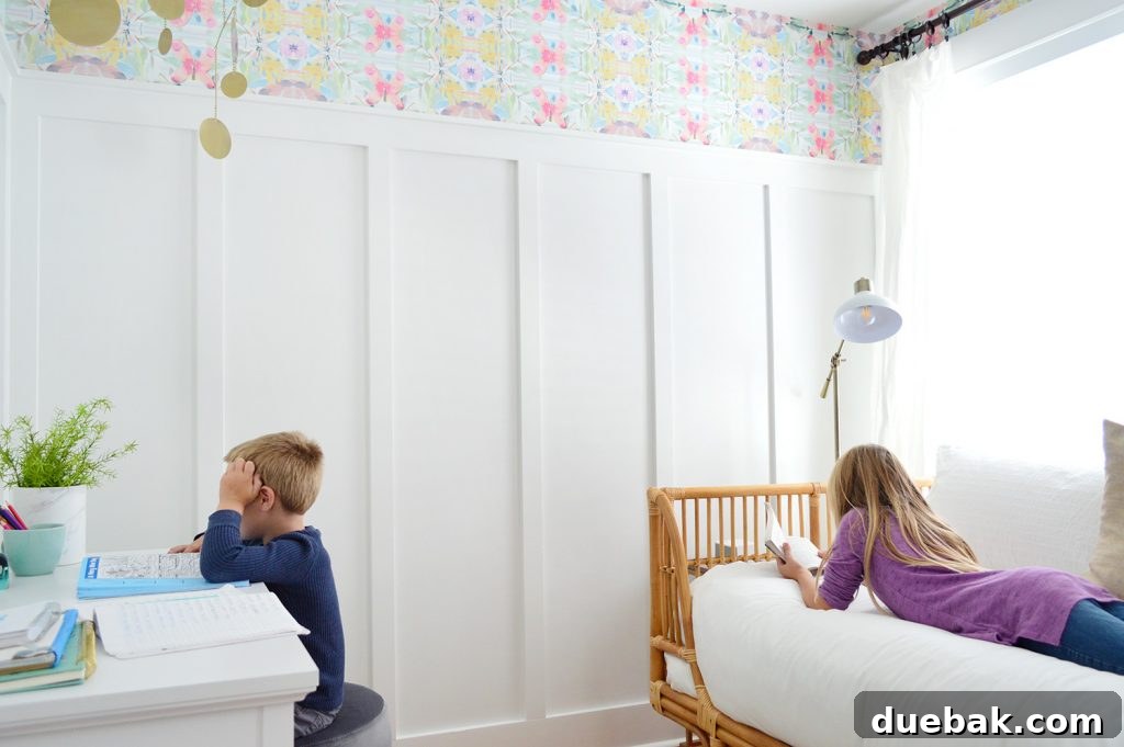 Textural Tides: Wallpaper and Board and Batten in a Beach Bedroom 6 Kids enjoying the newly designed bedroom with board and batten and patterned wallpaper