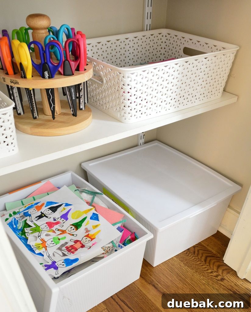 Large, colorful storage bins on a shelf, containing children's toys and craft projects, including a 90s troll doll.