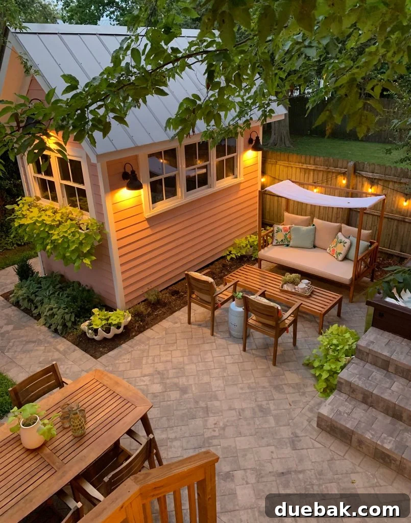 7 Beach House Renovations and the Story Behind Each Space 22 Rearranged backyard patio with daybed in a sunnier spot and dining table under the eave