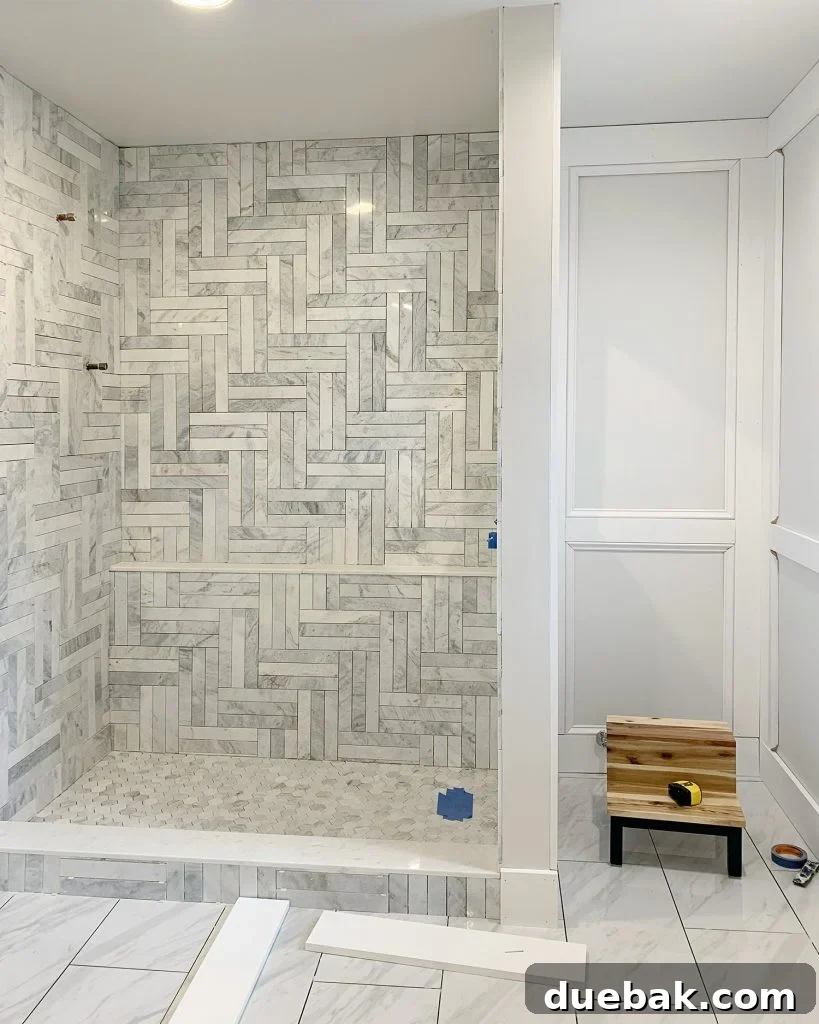 Elevate Your Walls with Decorative Molding 10 Unpainted Decorative Wall Molding in Master Bathroom with Tiled Marble Shower