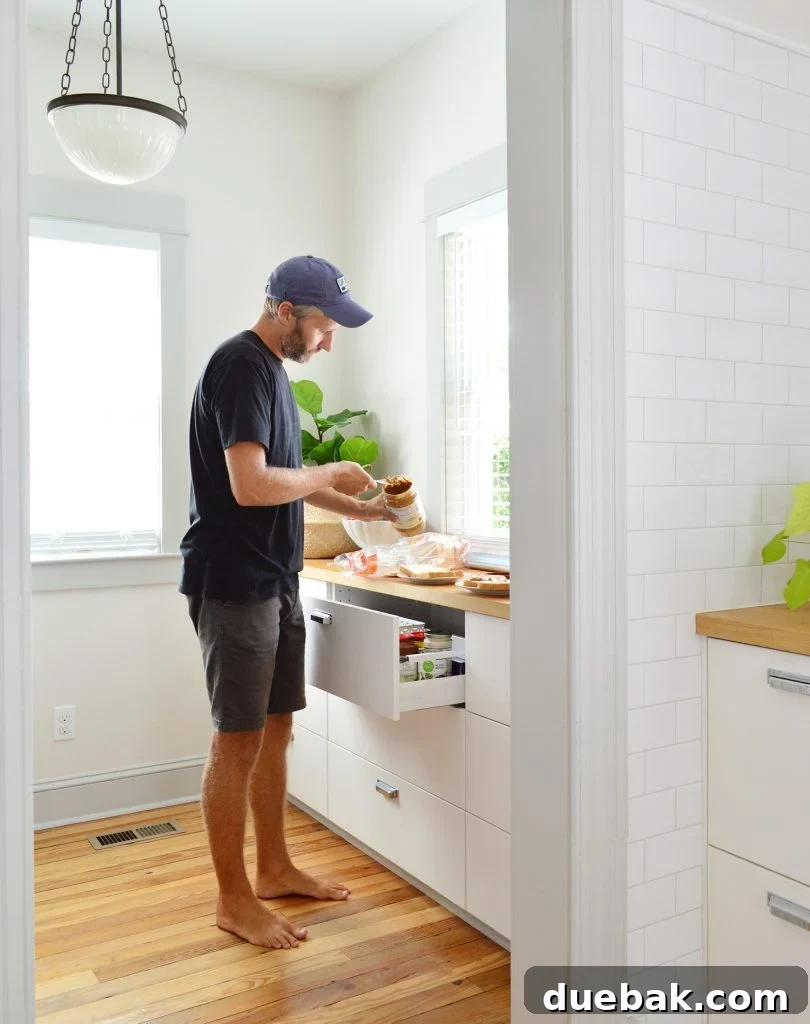 Pantry area with shallow drawers and counter space for food prep