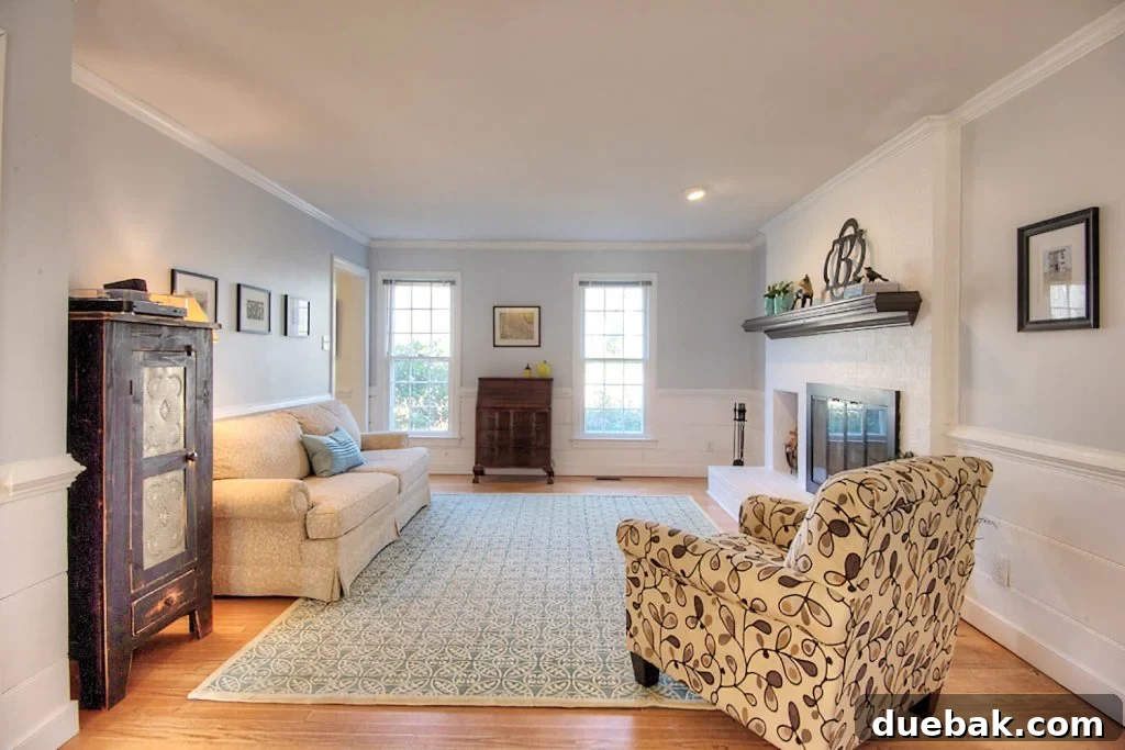 Our Costly Pre-Listing Oversight 4 An 'after' photo of the same living room, now staged to look spacious and neutral.
