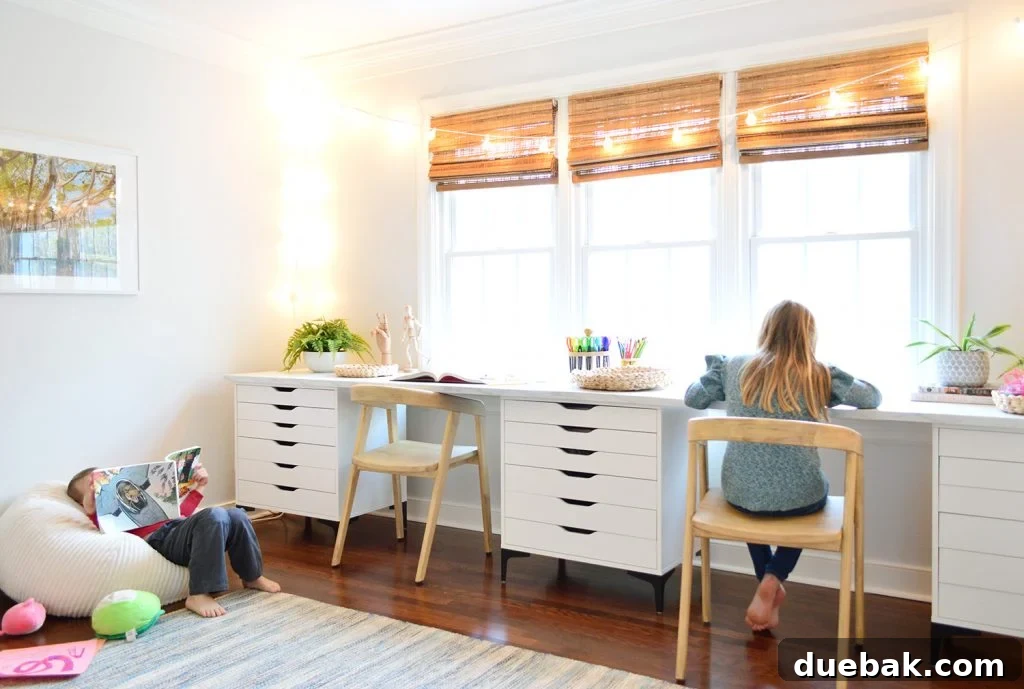 Kids Enjoying Art Room With Long Desk Workspace In Front Of Window And Bean Bag For Reading