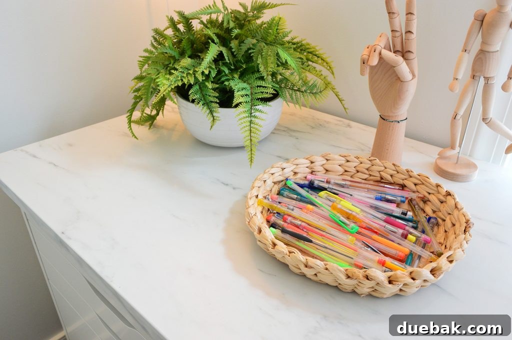 Kids Art Desk With Ikea Ekbacken Faux Marble Laminate Countertop With Basket Of Colorful Gel Pens
