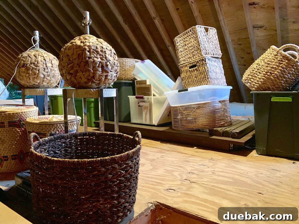 Close-up of a decorative woven basket with various textures, possibly holding throws or magazines.