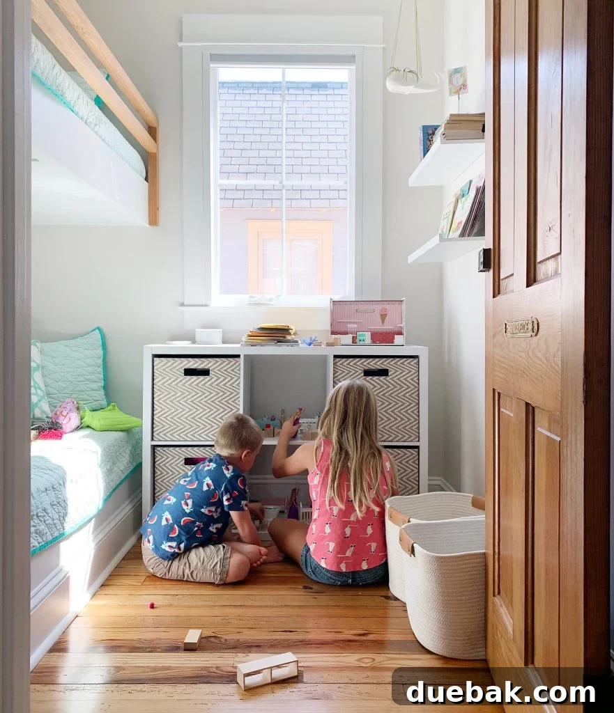 Our Petite Beach House: Maximizing Coastal Charm 12 A cozy and colorful bunk room for kids, demonstrating smart space utilization in a smaller area.