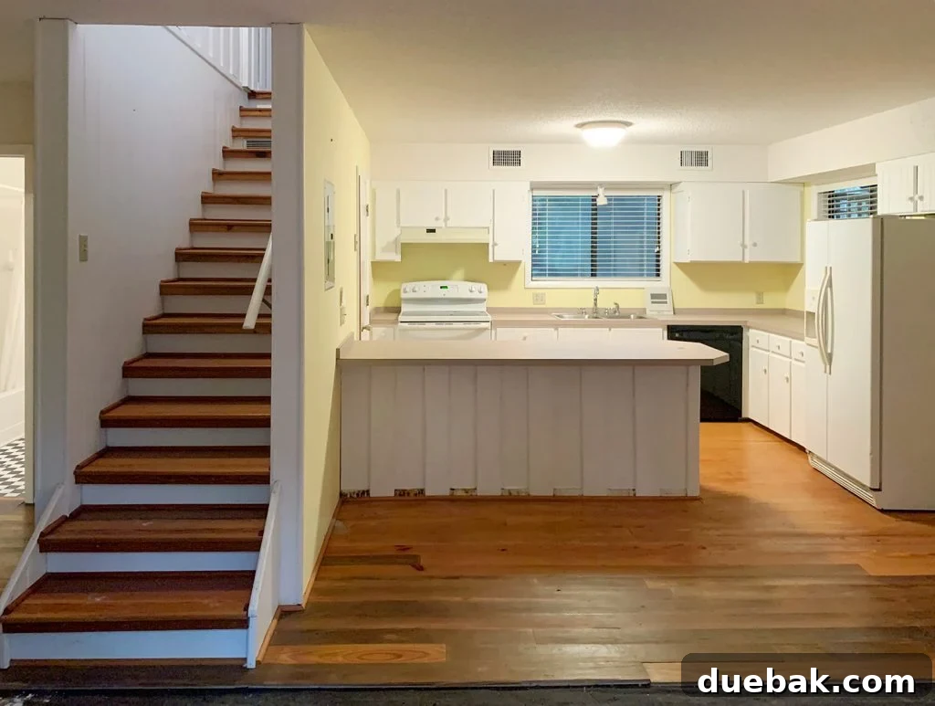 Staircase leading to the upstairs flex space.