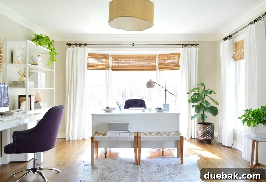 Bright home office with large wooden desk, comfortable desk chair, and ample shelving, staged for real estate showings in Richmond.