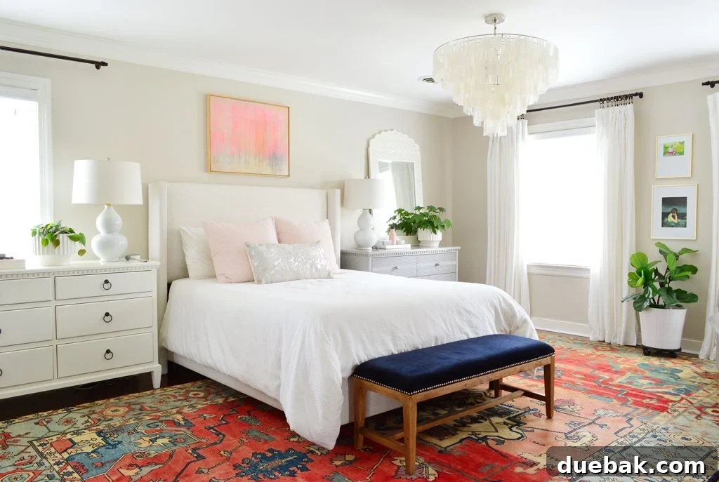 Elegant primary bedroom with a large bed, plush rug, and ample natural light, prepared for real estate viewings in Richmond.