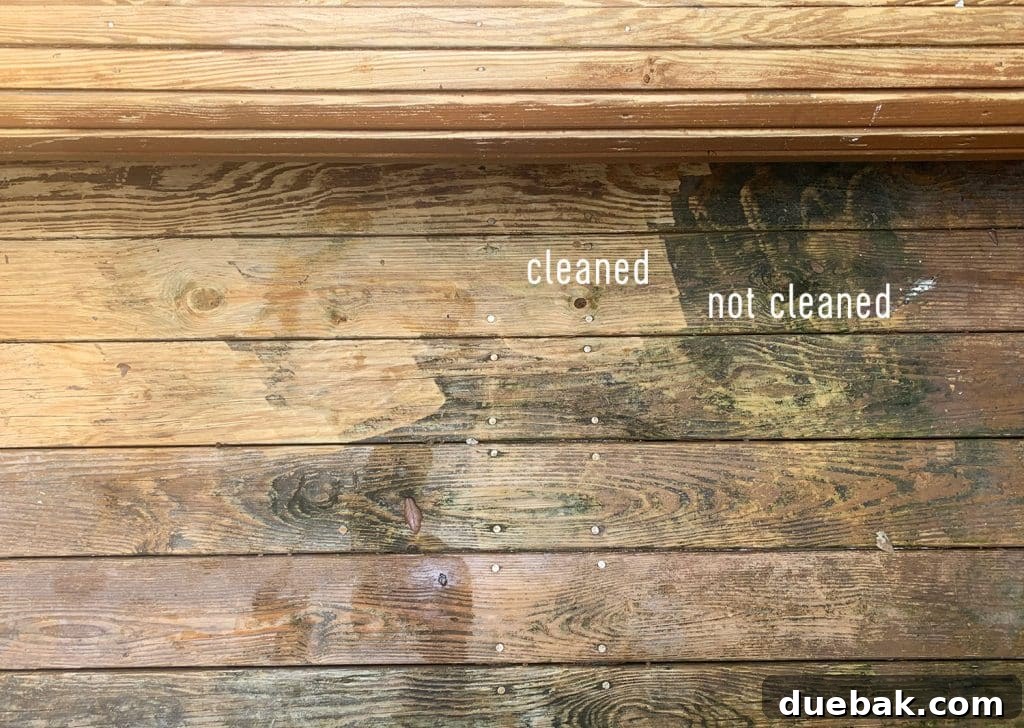 Side-by-side comparison of cleaned and uncleaned wooden floorboards after pressure washing.