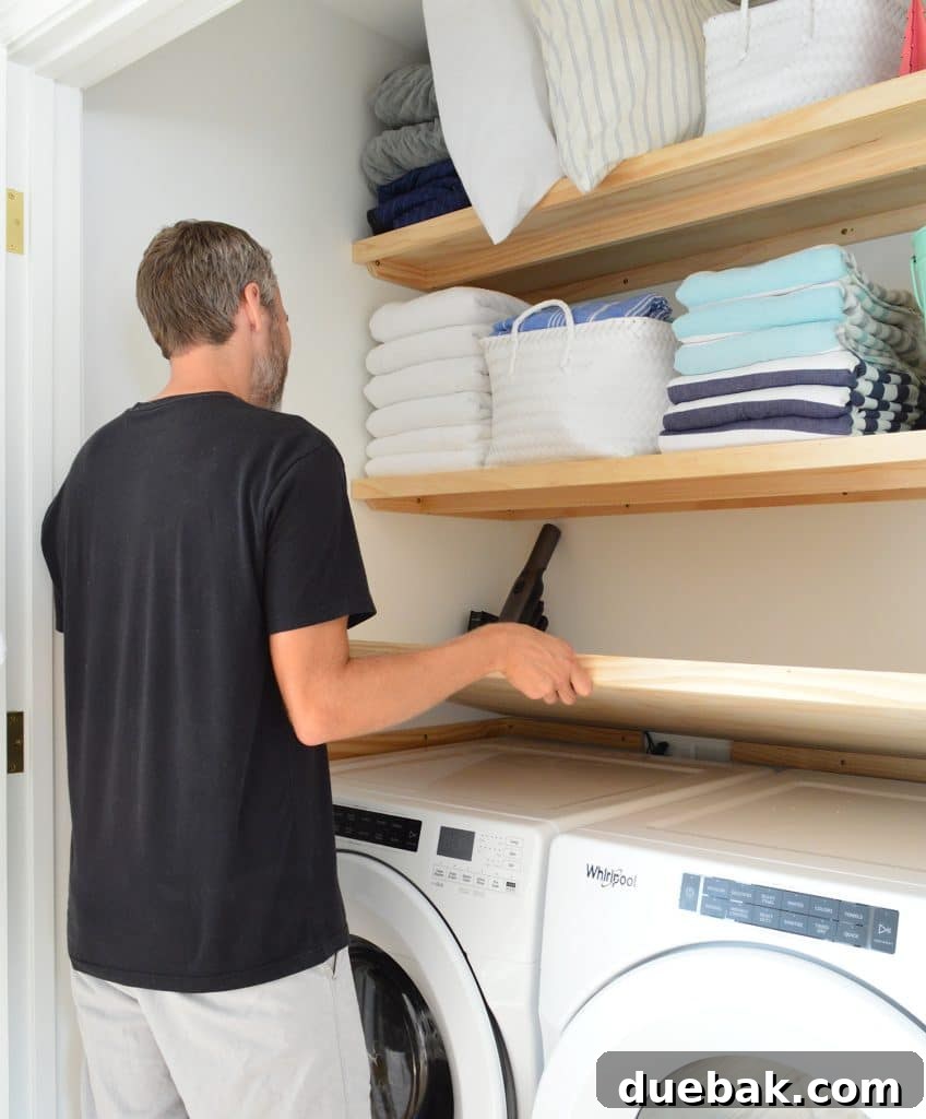 Removable laundry room counter over washer and dryer made from plywood