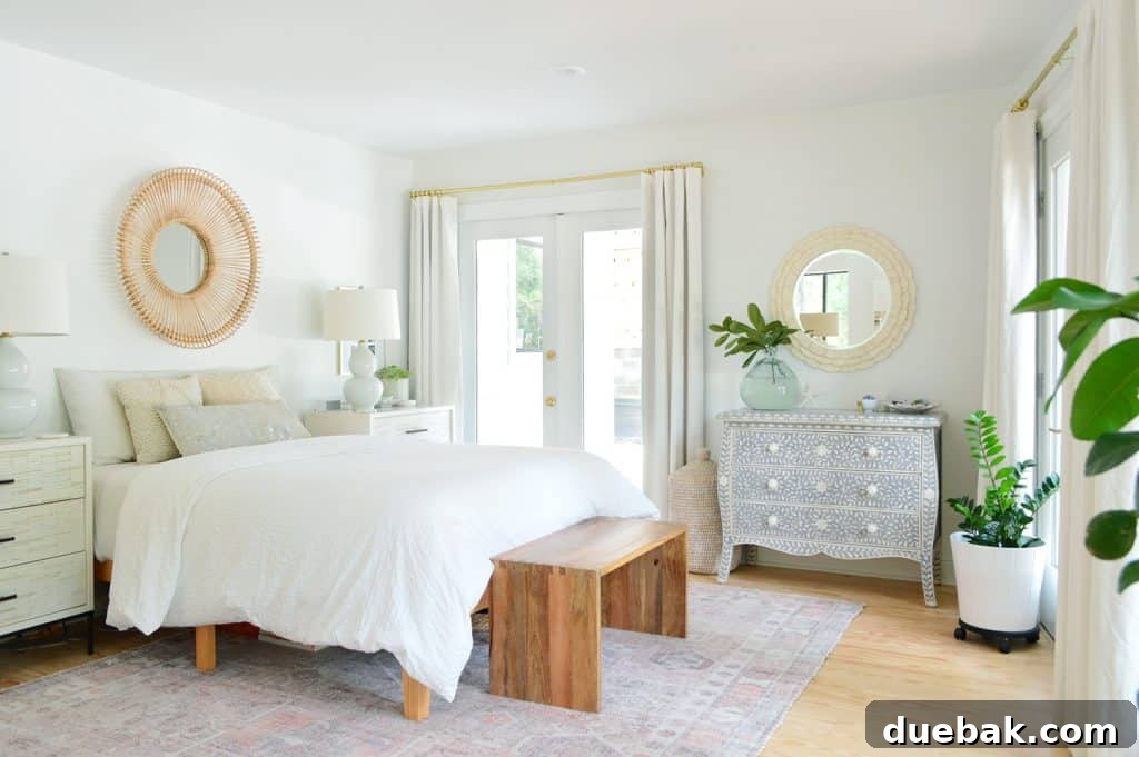 Bedroom Refresh: What's New and What's Next 6 Detailed shot of primary bedroom decor, including nightstands, lamps, and mirrors