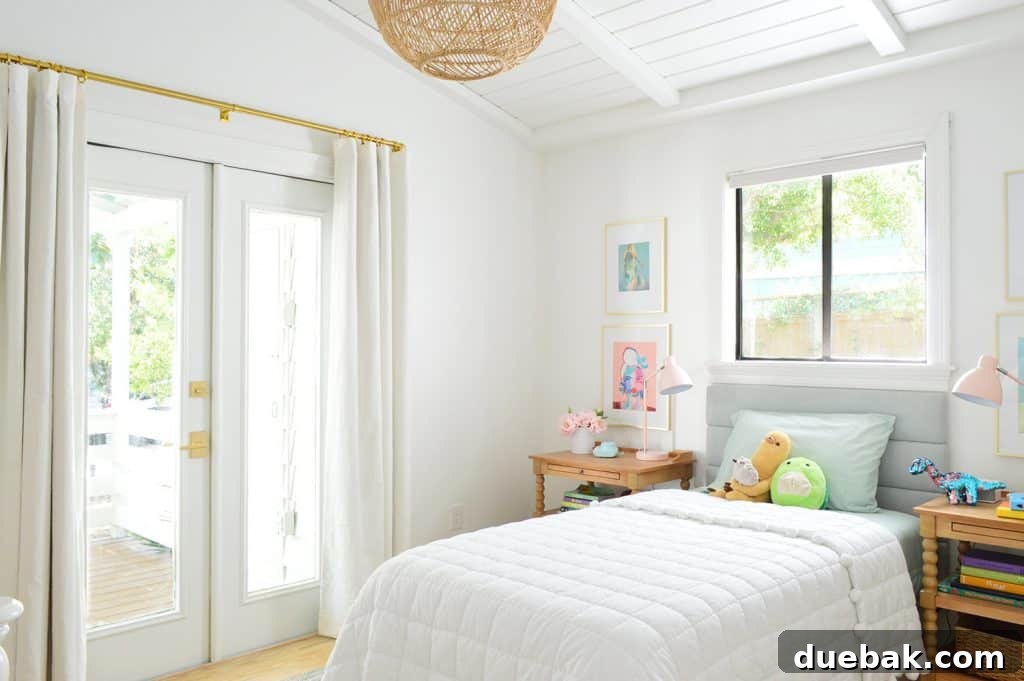 Craft Your Own Channel Tufted Headboard 9 The daughter's bed positioned under the window, showcasing the space constraints for a headboard.