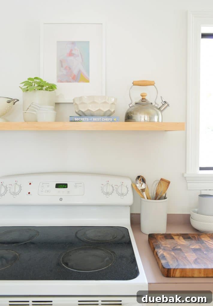 5 Speedy Kitchen Makeovers 2 Simple Floating Shelf Constructed Over Old White Stove In Minimal Kitchen
