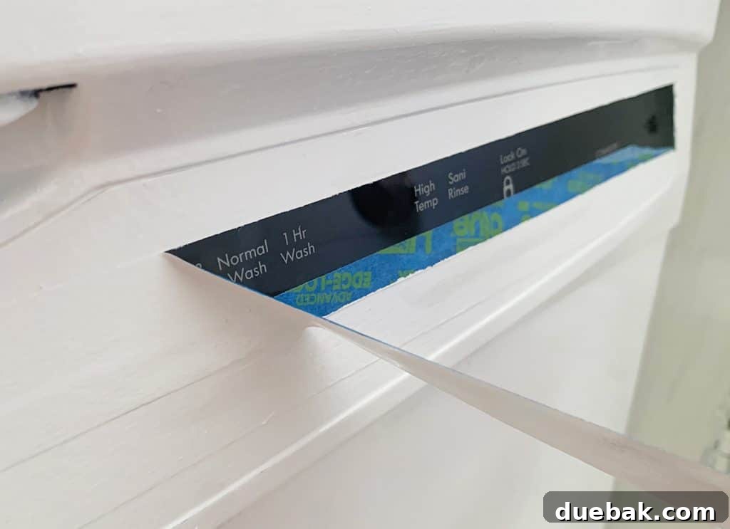 5 Speedy Kitchen Makeovers 13 Peeling Tape Off Of Dishwasher Controls After Painting Black To White