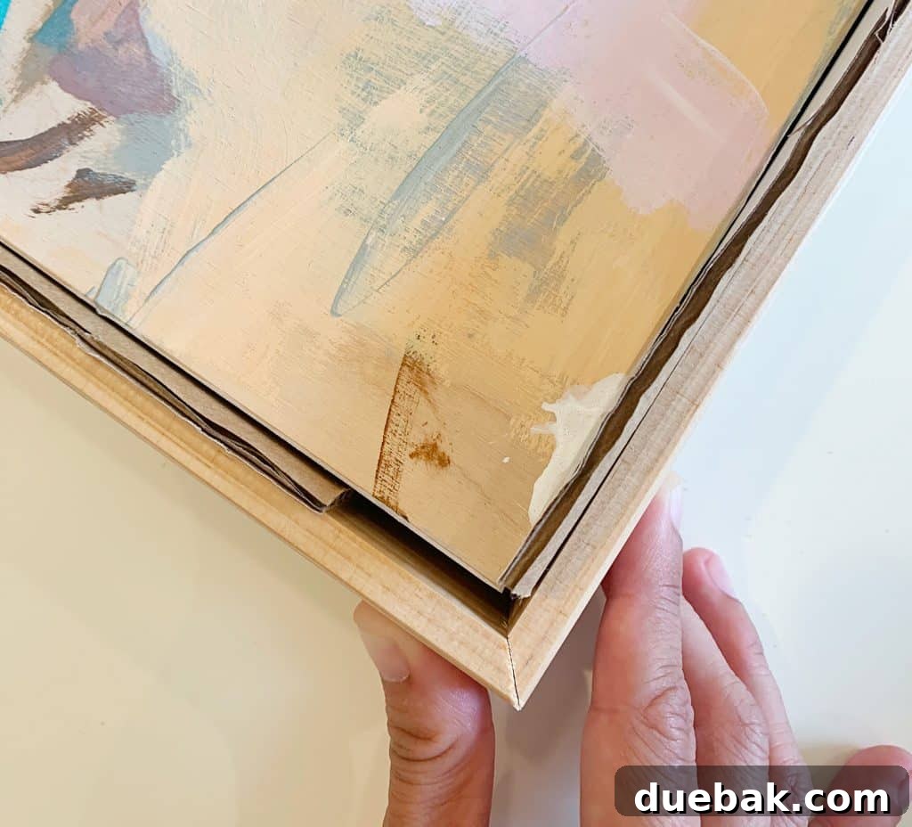 5 Speedy Kitchen Makeovers 26 DIY Float Frame Around Artwork Spaced With Cardboard