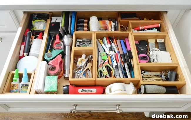 Old, larger junk drawer with various items
