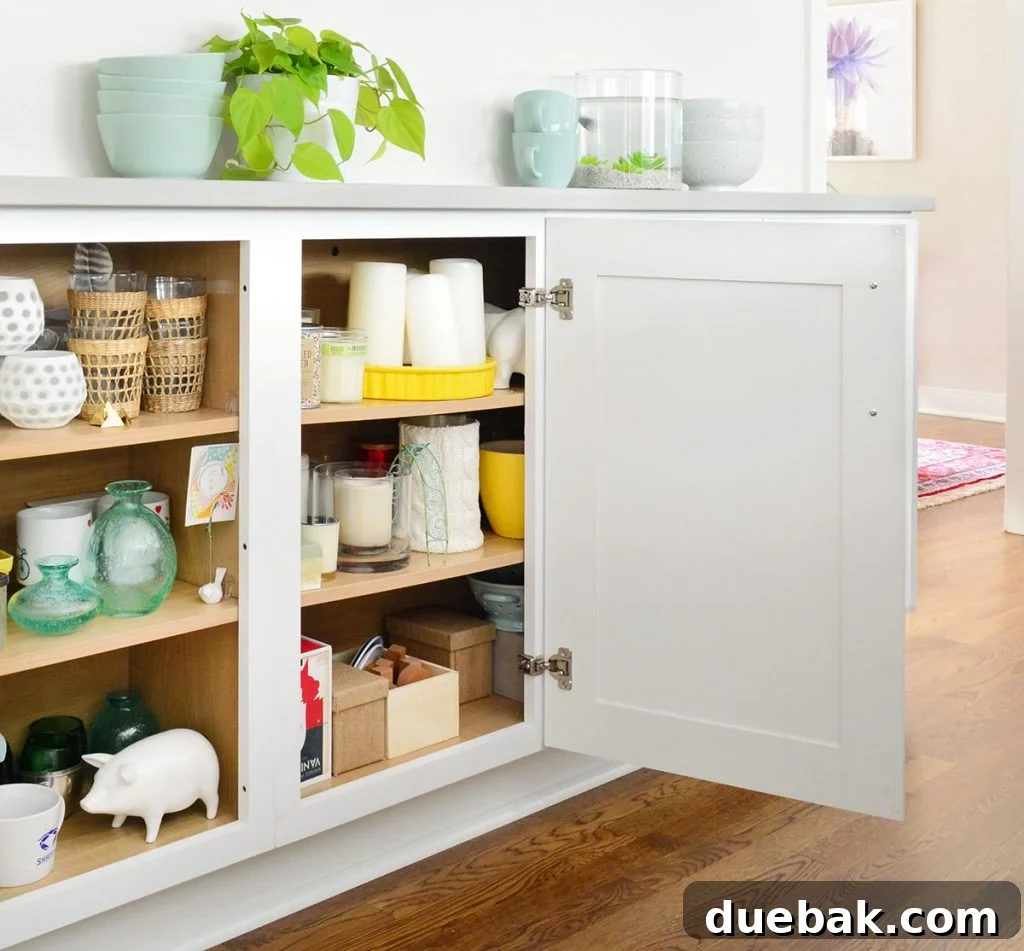 Old kitchen with organized cabinets and drawers