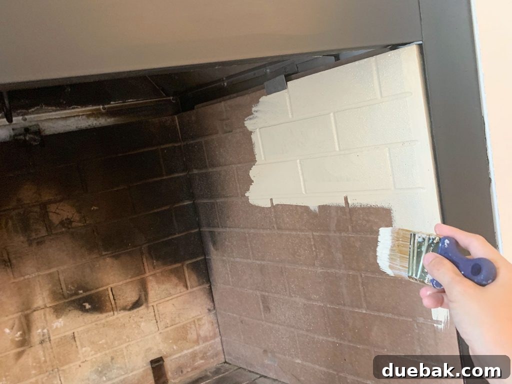 Crafting a Selenite Crystal Fireplace 14 Hand painting faux brick fireplace box with cream paint