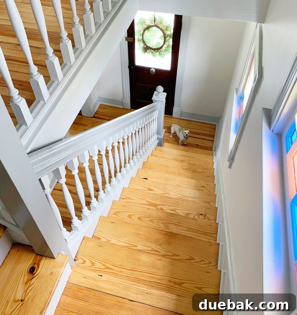 Step Up Your Style: Sisal Stair Runners 3 Overhead view of bare wood historic stairs in beach house