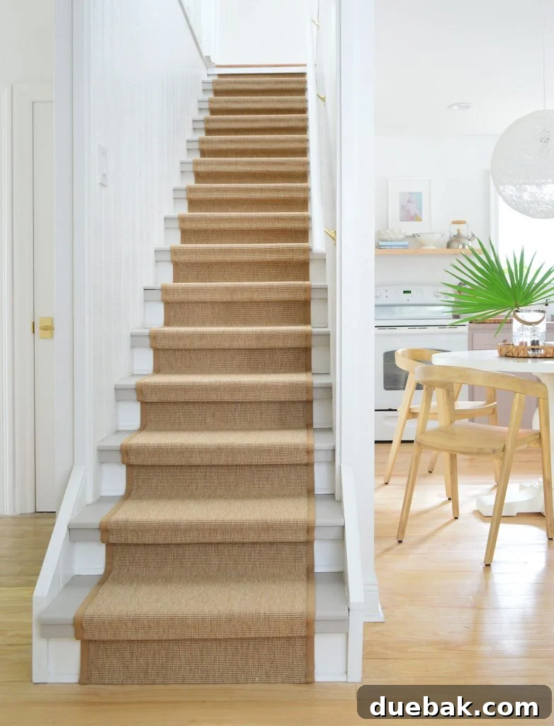 Step Up Your Style: Sisal Stair Runners 23 Finish Sisal Stair Runner On Staircase With Kitchen In Background