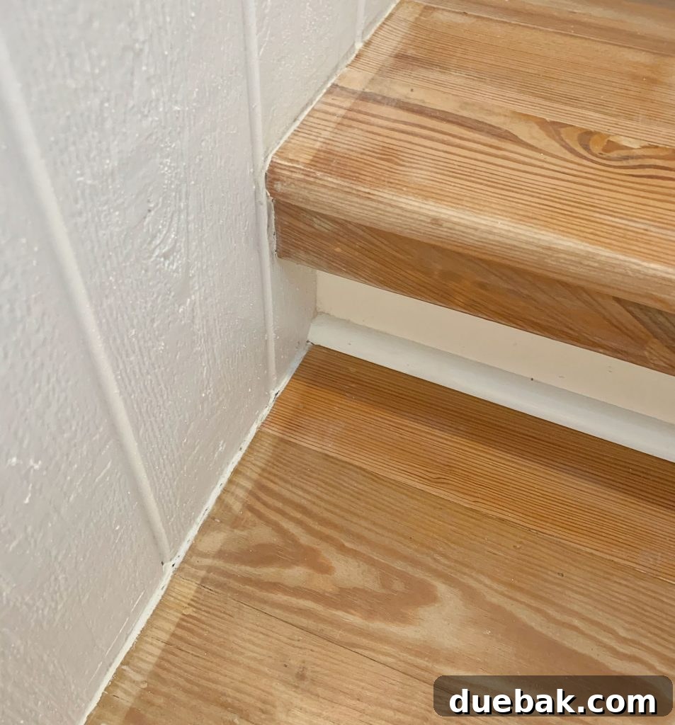Step Up Your Style: Sisal Stair Runners 5 Close Up Photo Of Wood Stairs With Discolored Border