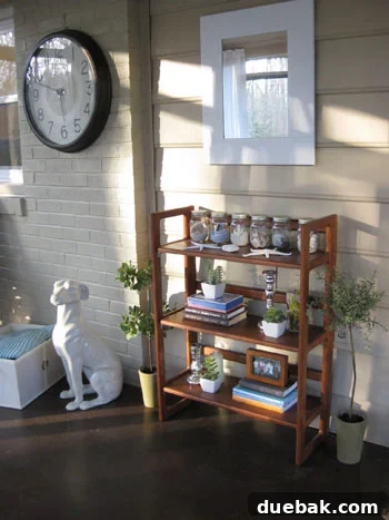 Elegant faux topiaries bringing life to a sunroom