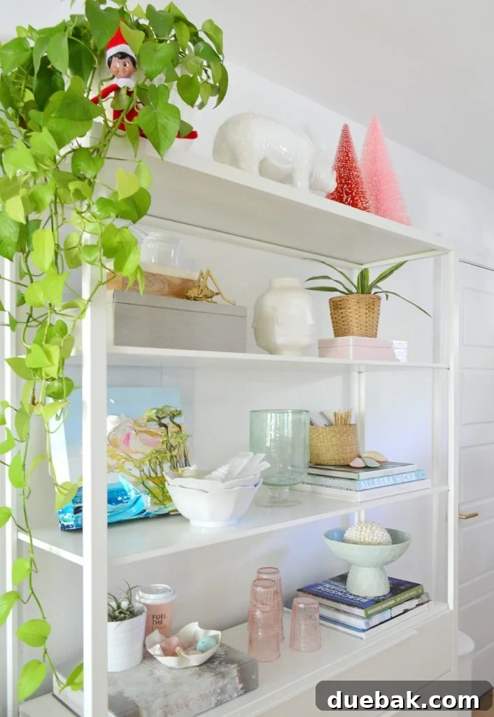 White Metal Kitchen Shelves With Plants Bottlebrush Trees and Elf On Shelf