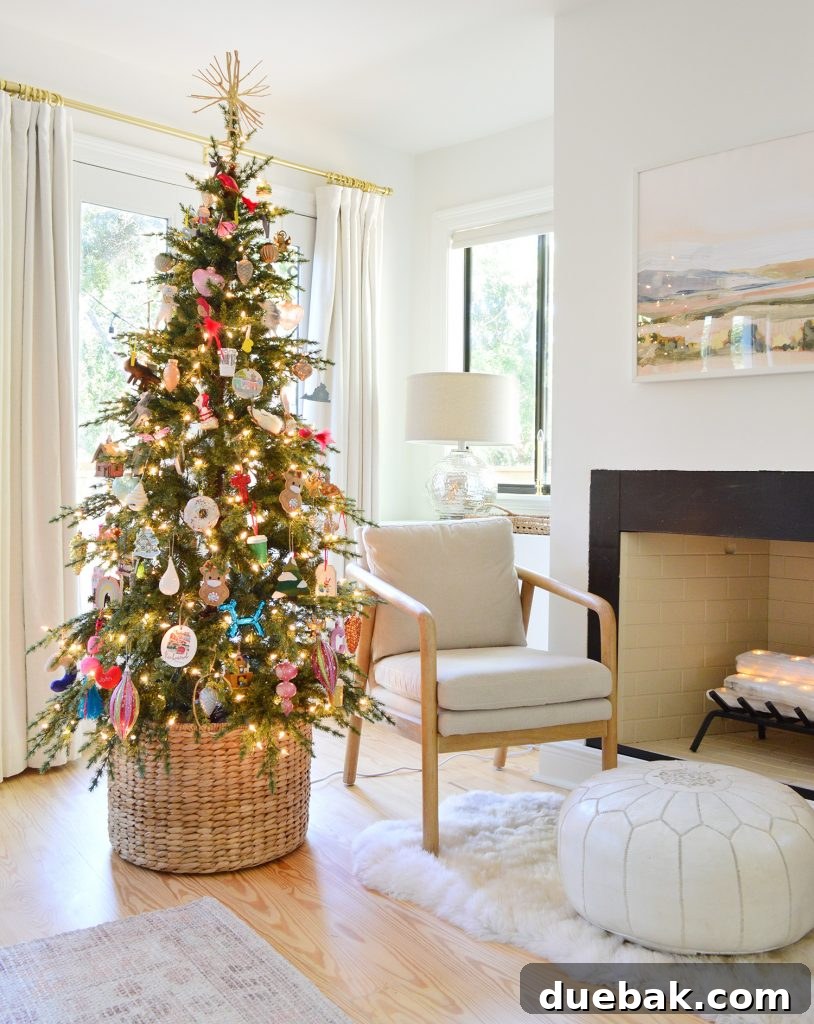 Christmas Tree in Woven Basket Near Fireplace
