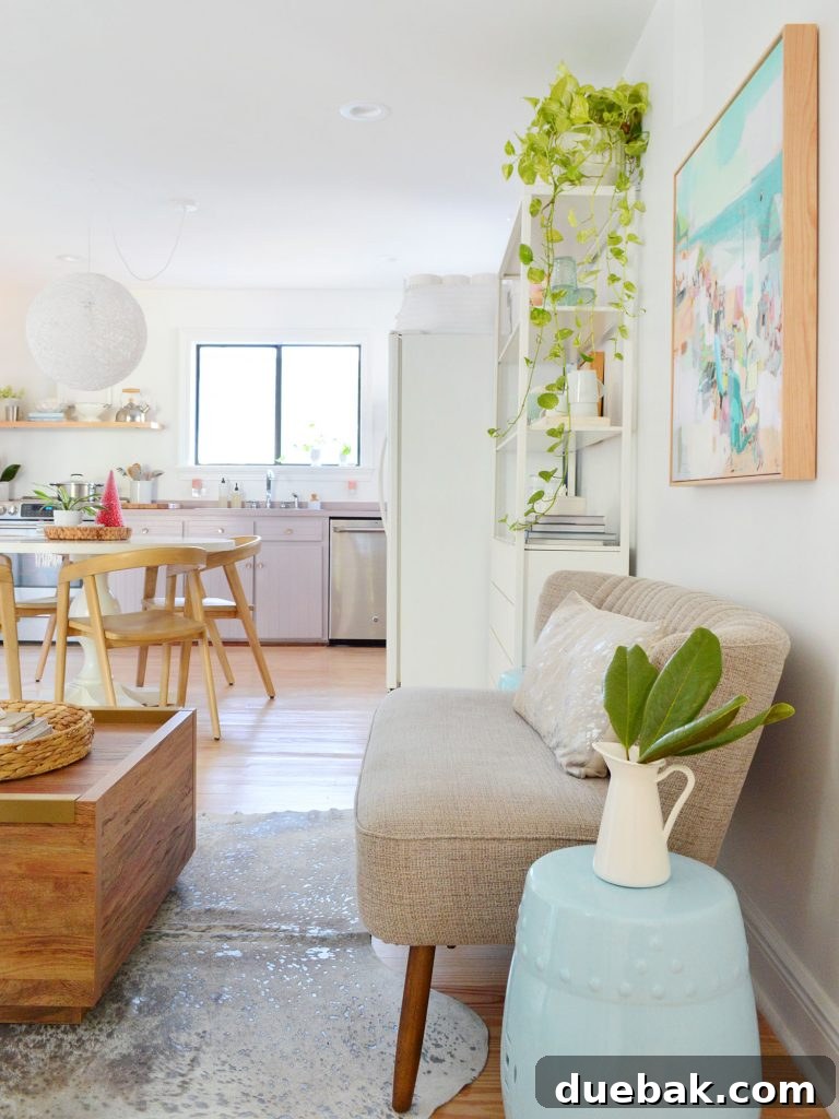 Walking space between the settee and coffee table leading into the kitchen area