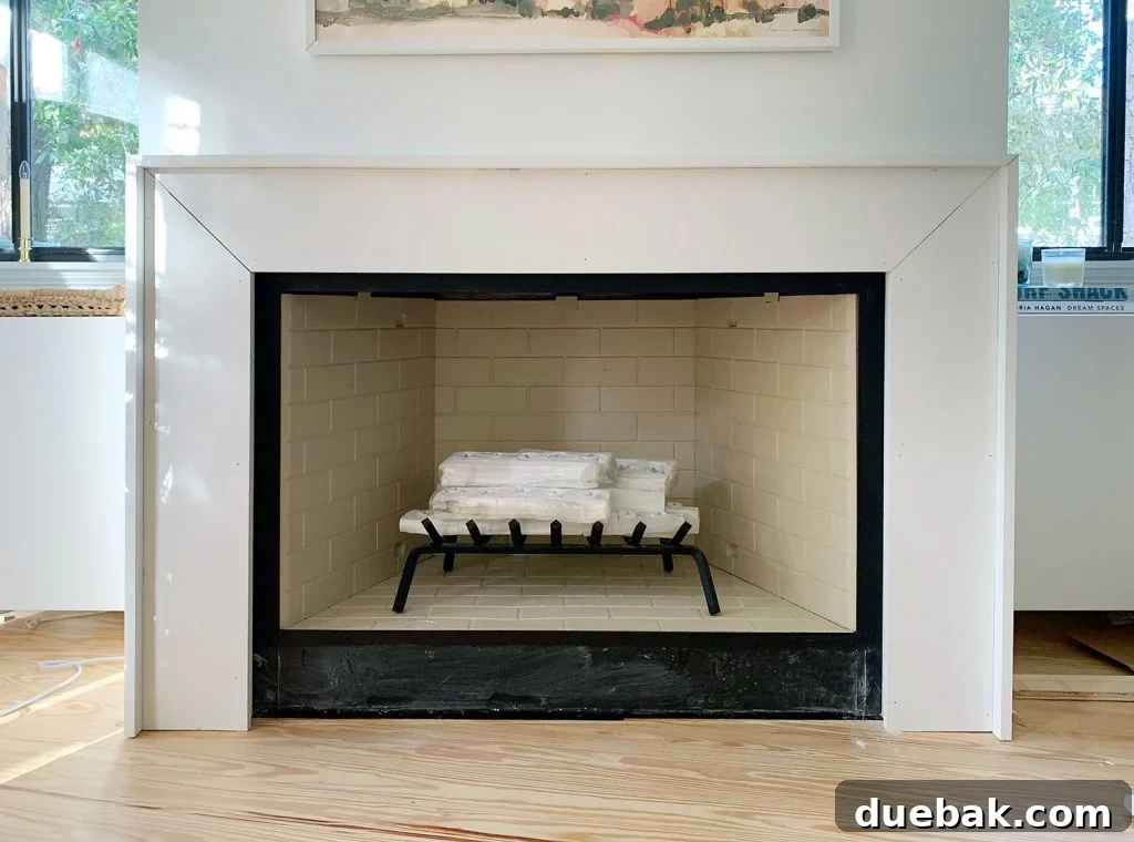 Mantel With White Trim Pieces Added Around Outside To Add Depth