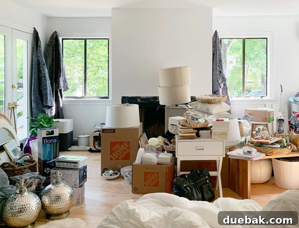 Mess of Moving Boxes In Bedroom On First Day