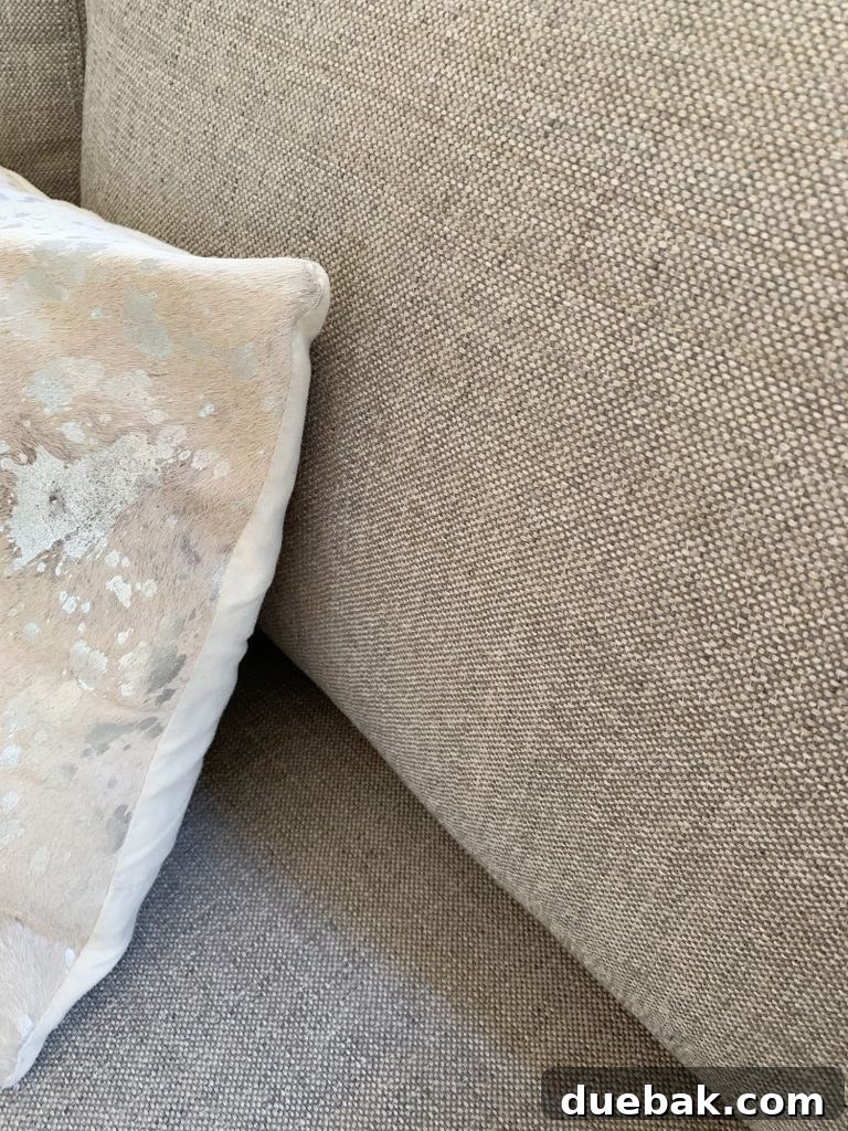 Intimate Comfort: Your Sitting Room Loveseat 21 Detail of gray fabric on loveseat