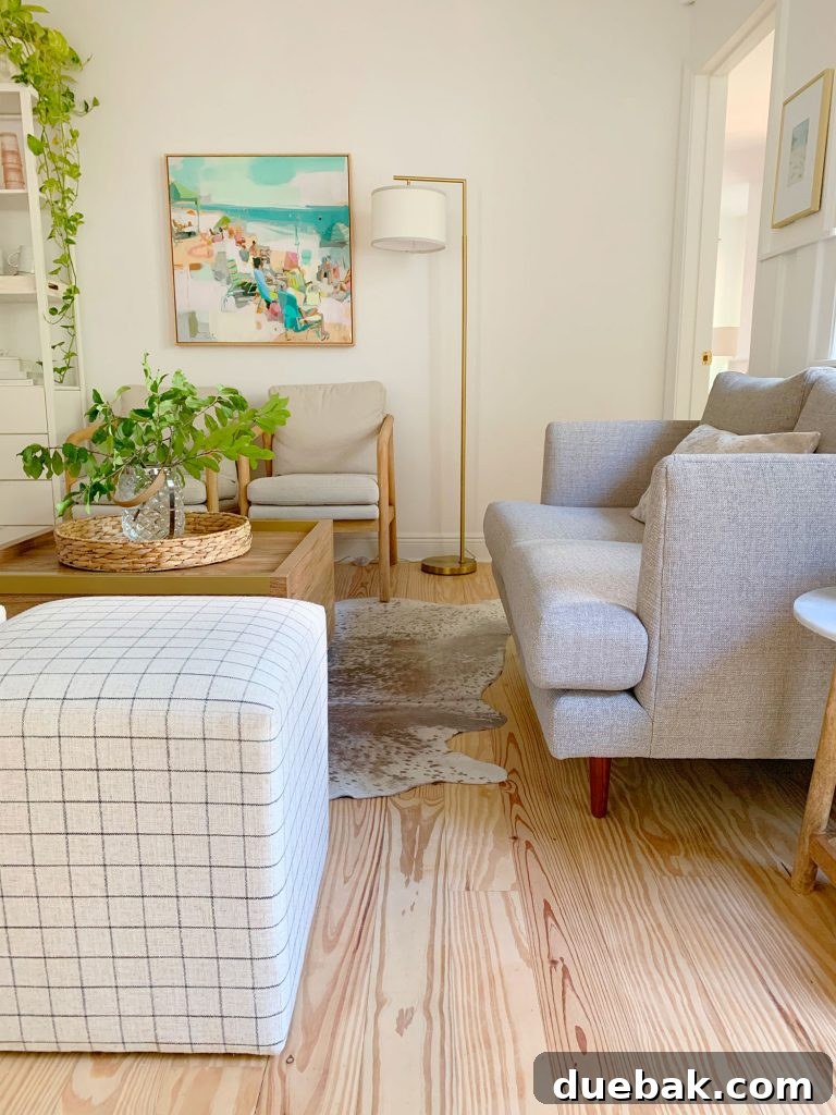 Intimate Comfort: Your Sitting Room Loveseat 6 Walkway space in front of gray loveseat in downstair sitting area